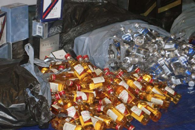 Above are some of the more than 100,000 mini bottles of liquor - and duty-free items -- that were allegedly pilfered from John F. Kennedy International Airport during the last five months by airport workers.